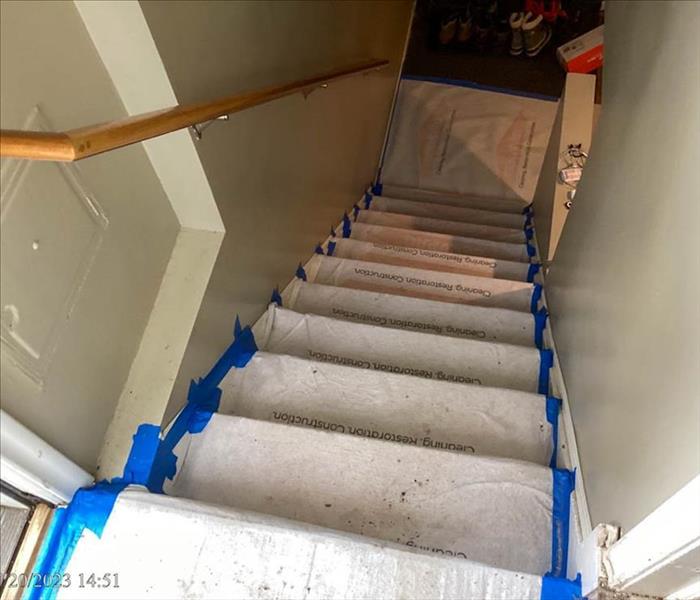 Covering the carpet to keep it clean
